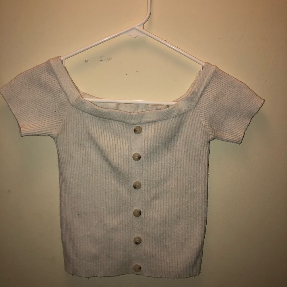 Off the shoulder white with buttons down middle